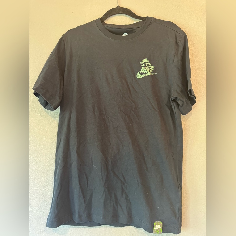 Nike Men's Black Tee with Green Logo